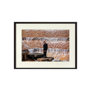 P-10-101-117-103-0005-1.jpg;Waterfall, full color, pensive figure, person, eyes closed, concrete, stone, water, reds
